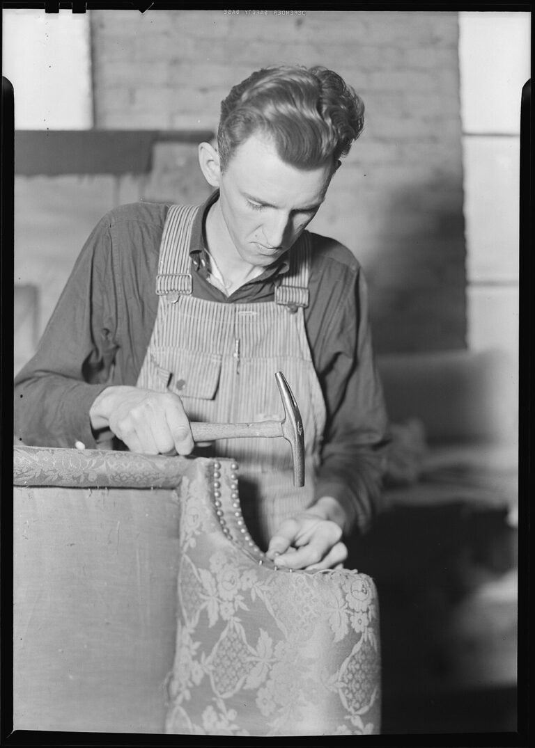 High Point, North Carolina - Upholstering. Tomlinson Chair Manufacturing Co. Decorative nail trim - (Brass rails... - NARA - 518474.jpg