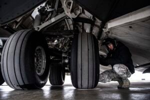 How to Check Tire Pressure When the Seasons Change Senior Airman Zachary Anderson, 911th Aircraft Maintenance Squadron crew chief, checks the air pressure of a tire on a C-17 Globemaster III at the Pittsburgh International Airport Air Reserve Station, Pa., May 6, 2020.jpg
